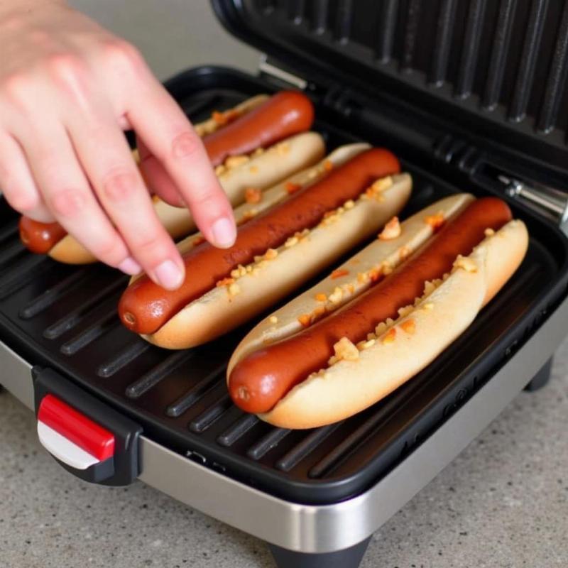 Preparing hot dogs and George Foreman grill