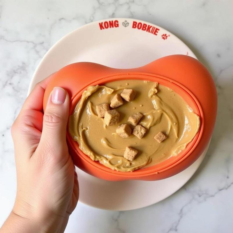 Frozen peanut butter in a dog toy