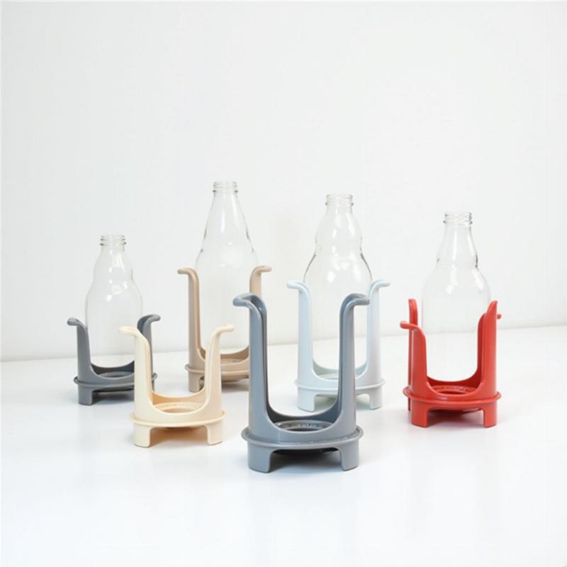 Various sizes of dog water bottle stands.